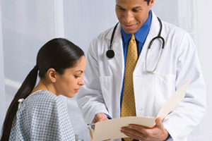 Doctor talking to patient