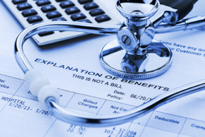 Gloomy image of healthcare costs and a stethoscope