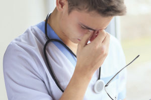 Tired-doctor-ThinkstockPhotos-490579479