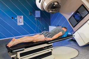 Man Receiving Radiation Therapy for Cancer Treatment