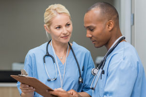 Nurses checking medical reports