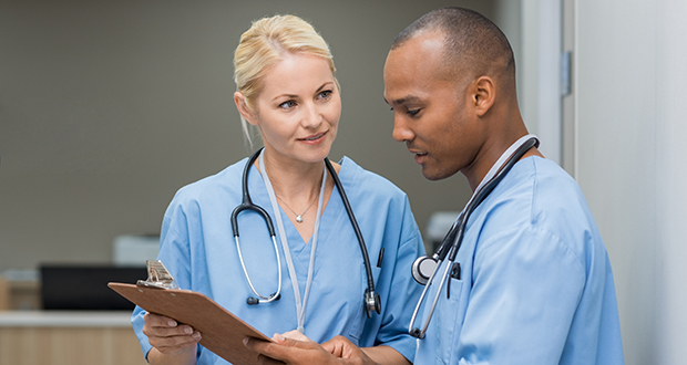 Nurses checking medical reports