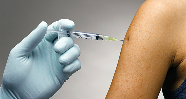 Person receiving a vaccine