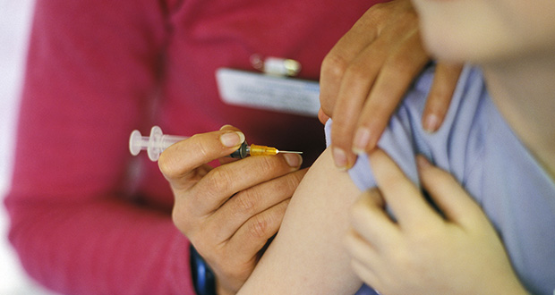 Hospital admissions would fall by more than 70,000 if vaccination advice implemented – report